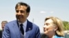 While staunch ally Georgia and its President Mikheil Saakashvili (left) can boast the most aid in the region, U.S. Secretary of State Hillary Clinton will struggle to maintian aid levels for other countries.