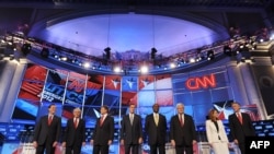 U.S. Republican presidential candidates stand on stage prior to the start of their debate on national security at the Daughters of the American Revolution Constitution Hall in Washington, D.C., on November 22.