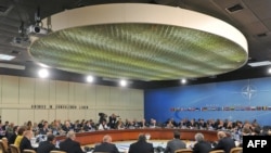 Some 56 foreign and defense ministers attended the meeting in Brussels.