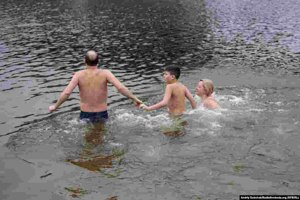 Entire families took their swims together.