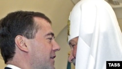 President Dmitry Medvedev and Patriarch Kirill speaking in January.