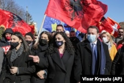 Acting Kosovar President Vjosa Osmani (center) participates in an election rally on February 12.