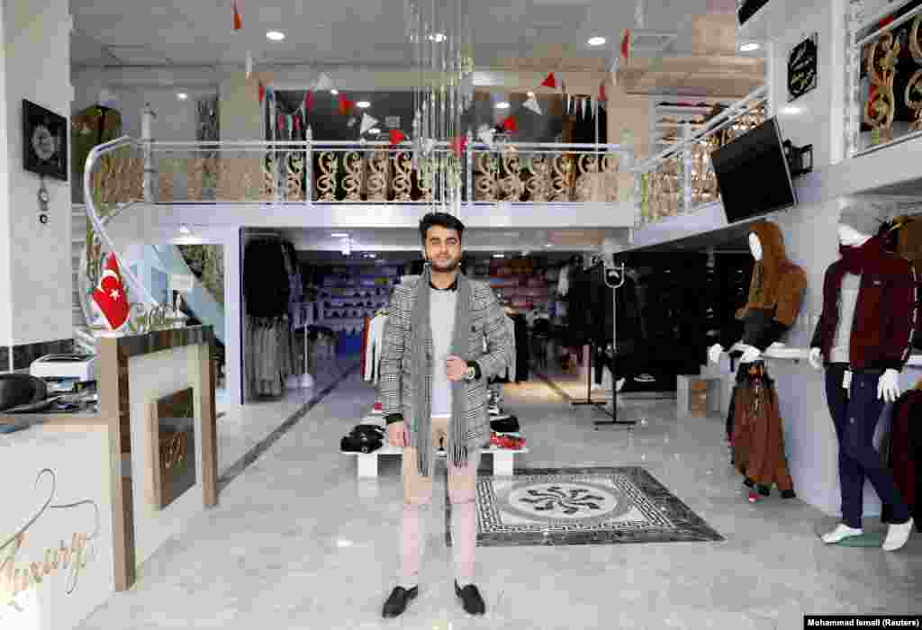 Owner of a luxury clothes shop Sohail Ataie, 22. &quot;We are tired of war. What we want is peace, to live a better life.&quot;