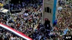 An image grab taken from footage uploaded to YouTube purports to show Syrian antigovernment protesters flooding the streets of Hama on July 1.