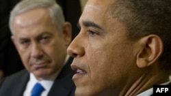 U.S. President Barack Obama and Israeli Prime Minister Benjamin Netanyahu (left) speak during a meeting in the Oval Office on March 5.