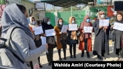 Afghan women and girls and women protest in Kabul against Taliban repression on November 30.