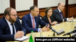 U.S. Assistant Secretary of State Francis Fannon (center) speaks during a meeting with the prime minister of Ukraine in July.