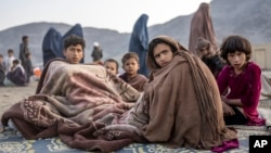 Afghan refugees settle in a camp in Afghanistan near the Pakistani border after being ordered home by Islamabad.