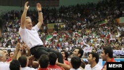 Men's sports events, such as volleyball, in Iran are often exclusively male affairs as women are banned from even watching the contest. (file photo)