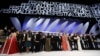 Winners and hosts onstage at the conclusion of the 66th Cannes International Film Festival in May.