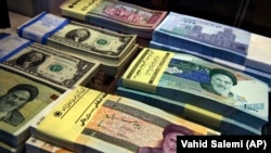 The rial has lost 70 percent of its value in the past year.