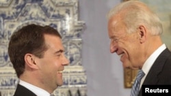 Russian President Dmitry Medvedev meets with U.S. Vice President Joe Biden in Gorki today.