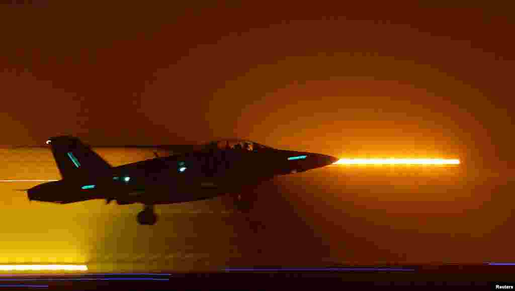 A U.S. Marine F18 jet takes off from a base in Kuwait to conduct a mission in Iraq on March 20, 2003.