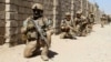 Afghan National Army commandos take position during a military operation in Helmand Province in October 2016.