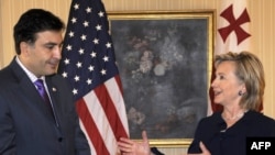 Georgian President Mikheil Saakashvili with U.S. Secretary of State Hillary Clinton in New York on September 21