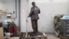 A Vladimir Lenin statue belonging to the Marxist-Leninist Party of Germany stands alone in storage.