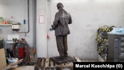 A Vladimir Lenin statue belonging to the Marxist-Leninist Party of Germany stands alone in storage.