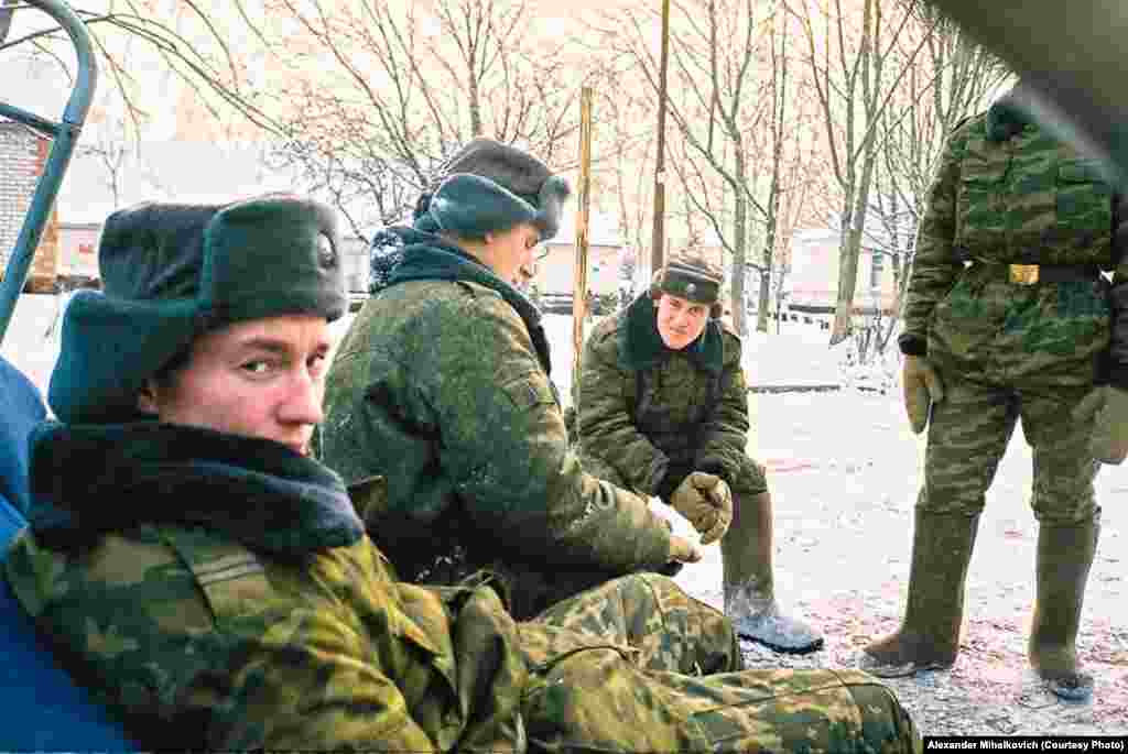 Soldiers take a quick break during the daily snow-clearing.