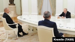 Russian President Vladimir Putin (center) meets with Azerbaijani President Ilham Aliyev (left) and Armenian Prime Minister Nikol Pashinian earlier this year. 