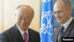 IAEA Director-General Yukiya Amano (left) and Sergei Kiriyenko, Russia's atomic energy chief, at UN headquarters in Vienna on March 29.