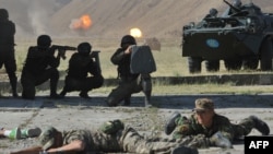 Kyrgyz members of the joint Rapid Deployment Forces take part in military exercises at the Ala-Too training ground, some 20 kilometers outside Bishkek, in August.