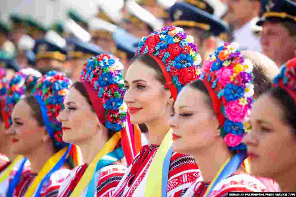 Women in traditional Ukrainian dress attend the Independence Day parade in Kyiv.