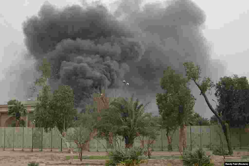 Plumes of smoke rise from the U.S. Embassy compound in March 2008 after Iranian-backed militias shelled&nbsp;Baghdad&#39;s Green Zone. Quds Force commander Soleimani played such a pivotal role in Iraq&rsquo;s security through various militia groups that U.S. General David Petraeus, the overall head of U.S. forces in Iraq at the time, sent messages to him through Iraqi officials.