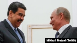 Russian President Vladimir Putin (right) meets with Venezuelan President Nicolas Maduro in Moscow on October 3, 2017.