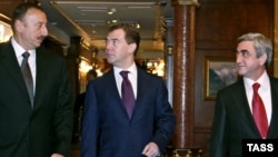 Russian President Dmitry Medvedev (center) met with his Armenian and Azerbaijani counterparts, Serzh Sarkisian (right) and Ilham Aliyev, in Sochi.