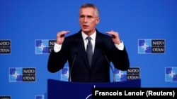 NATO Secretary-General Jens Stoltenberg speaks to the press ahead of a two-day NATO defense ministers meeting at the alliance's headquarters in Brussels on October 23.