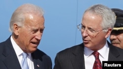 As Vice President, Joe Biden (left) speaks to U.S. Ambassador to Pakistan Cameron Munter in 2011. (file photo)