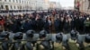 Riot police officers guard the area outside the St Petersburg Legislative Assembly building during a rally in support of Aleksei Navalny on January 31.