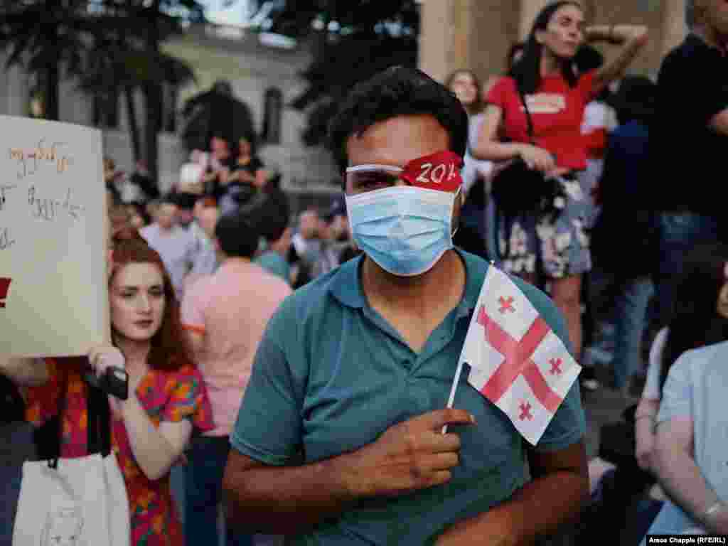 This protester&#39;s eye patch reads &quot;20 percent,&quot; referring to the amount of Georgian territory made up by South Ossetia and Abkhazia, the two breakaway regions under the control of the Russian military.