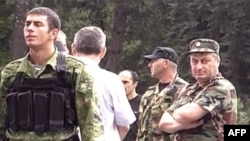 South Ossetian leader Kokoity (right) with separatist troops on August 7