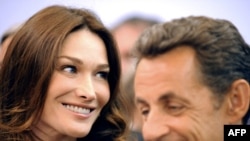 Iran's state press accused French First Lady Carla Bruni-Sarkozy (left) of using the case to cover up her cheating on husband Nicolas Sarkozy.