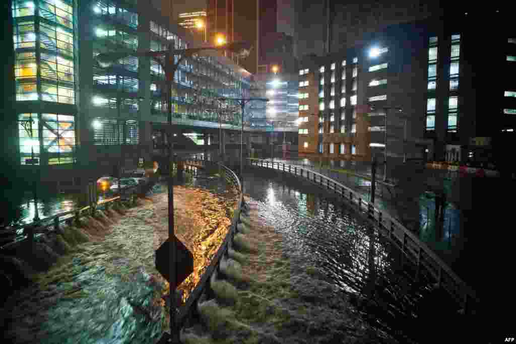 Water rushes into the Carey Tunnel (previously the Brooklyn Battery Tunnel) in New York.