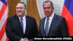 U.S. Secretary of State Mike Pompeo (left) and Russian Foreign Minister Sergei Lavrov shake hands as they pose for a photo prior to their talks in the Russian city of Sochi in May.