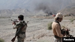 Afghan border police keep watch after a Taliban attack at Torkham district in Jalalabad Province on September 2.