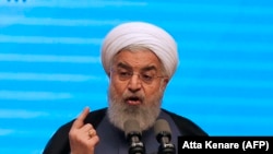 Iranian President Hassan Rohani gives a speech in the city of Tabriz on April 25, 2018.