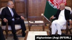 The cancellation of the trip is reportedly due to President Ashraf Ghani's (right) opposition to the plan proposed by U.S. envoy Zalmay Khalilzad (left).