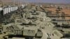 Iranian Army tanks line up during military exercises near the border with Azerbaijan that have drawn ire from Baku. 