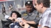 Putin's Assurances To The Contrary, Protesters Are Beaten And Detained