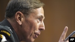 General David Petraeus testifies on Capitol Hill in Washington on June 23.