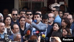 Selahattin Demirtas, co-leader of the pro-Kurdish Peoples' Democratic Party (HDP), speaks at a protest on October 27 against the arrest of two mayors in the predominantly ethnic-Kurd city of Diyarbaki for lleged links to terrorism.