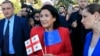 Georgian President Salome Zurabishvili (center) attends a public rally in support of Georgia's EU aspirations in Tbilisi on June 16. 