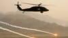 A U.S. Army Blackhawk helicopter flies in Afghanistan's Kandahar Province on March 25.