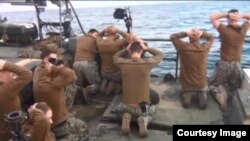 The U.S. Navy fired the commander of 10 sailors who were briefly captured by Iran after straying into Iranian waters in January.