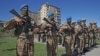 Azerbaijani servicemen take part in a parade in Susa/Shushi on September 27. 