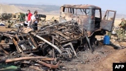 The site of a suicide bomb attack at a military firing ground outside the Daghestani town of Buinaksk today