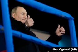 Russian President Vladimir Putin at the opening ceremony of the Olympics following his summit with Xi on February 4.